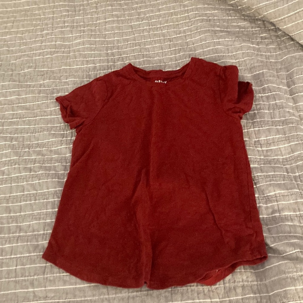 This is a red shorts sleeve old navy shirt